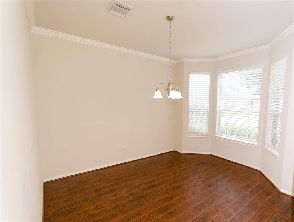 Dining room towards front of the house, right next to the kitchen. Lots of light!