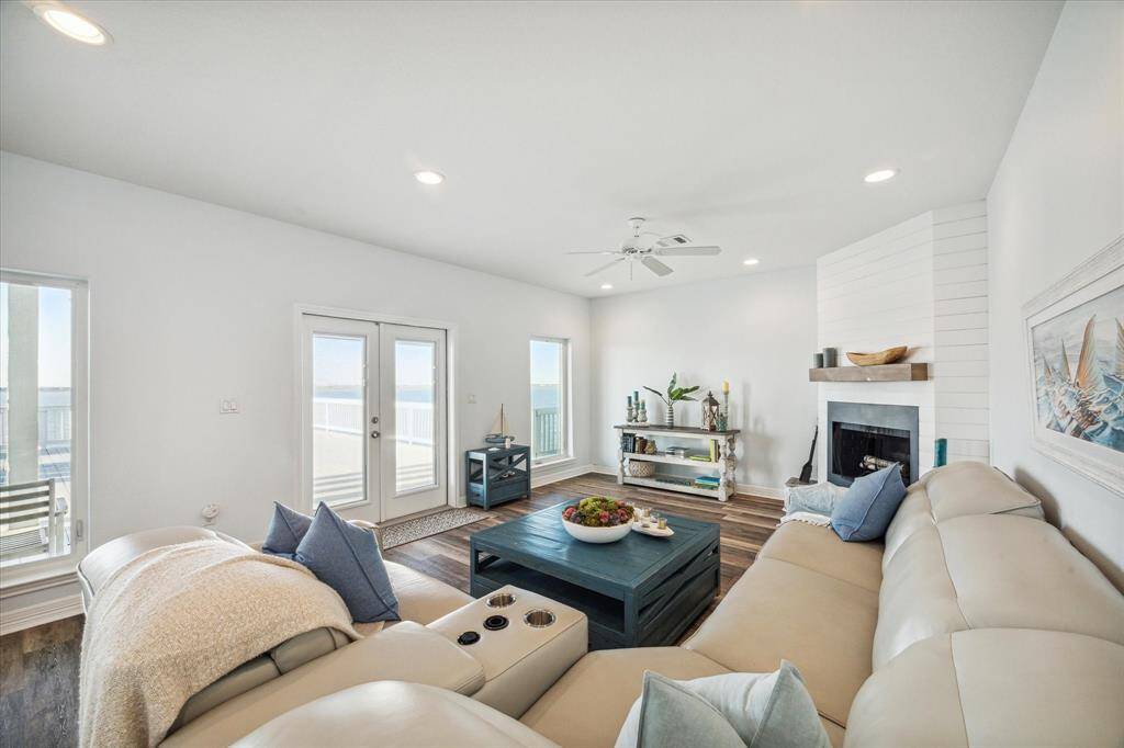 cozy family room with wood burning fireplae