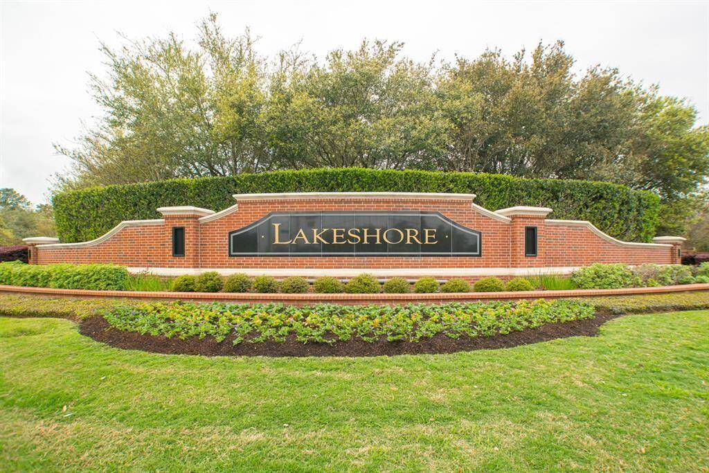Welcome to Lakeshore: an inviting, upscale community highlighted by a pristine brick entrance and elegant landscaping.