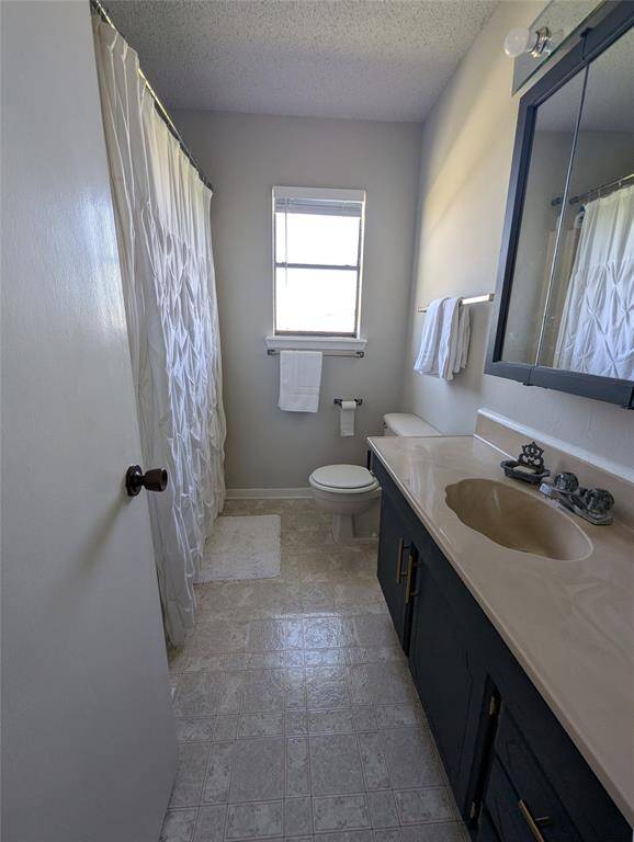 Primary bathroom with tub/shower combo