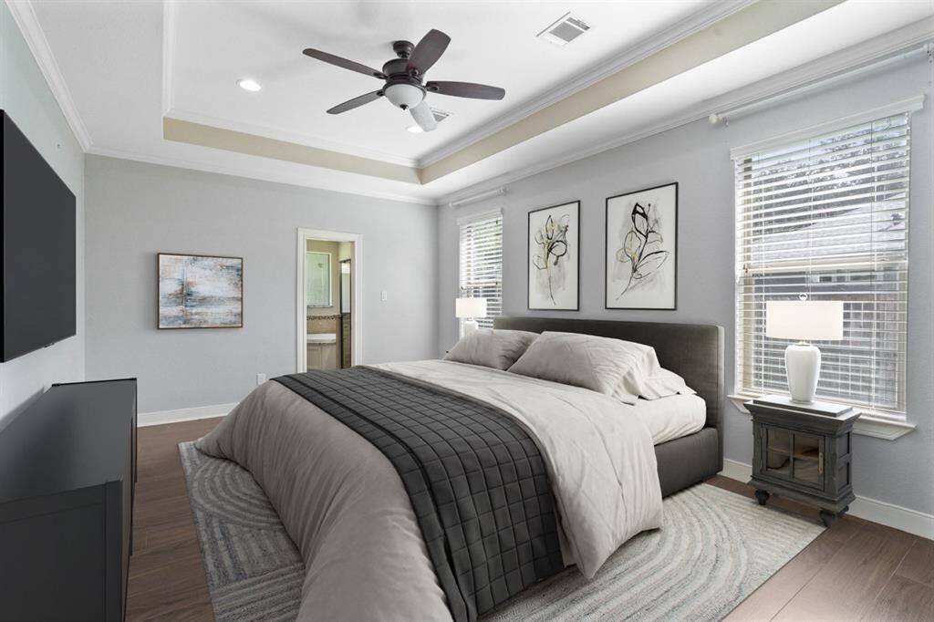 Here's an idea of how the primary bedroom could be arranged.  **Virtually Staged**