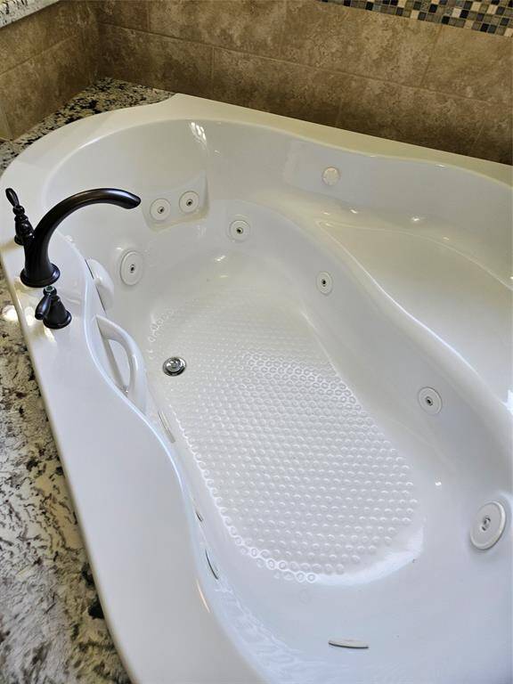 This jetted tub could be your "spa" every evening! Add a glass a wine and candles to the side for true relaxation.