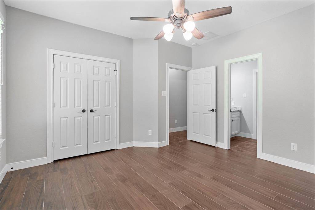Another nice sized bedroom (#3) that is light and bright offering ample space and a nice closet.  The jack and jill bathroom is to the left.