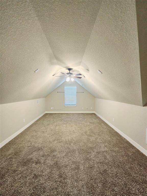 The bonus room sits above the garage. It is also wired for surround sound. Use as a guest room for out-of-town visitors, a playroom, a gym or possibly an office.