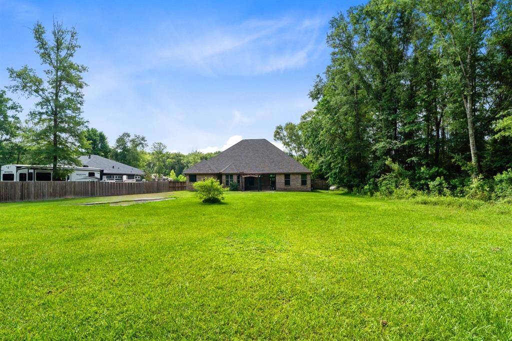 Spacious 1.7-acre lot with an open canvas waiting for your vision of additions.  Add a workshop, a pool, a garden, a chicken coop, the possibles are endless and open to your creativity.