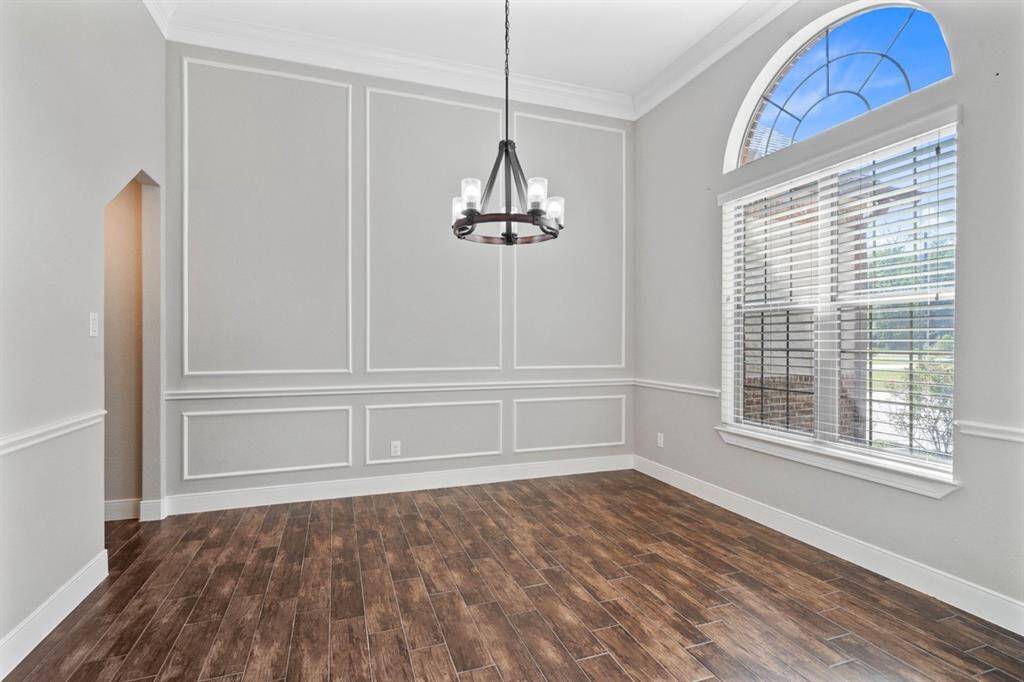 Formal dining to the right of the foyer offers room for a large size table.  Imagine hosting your family and friends in this room. Good friends, good food and good memories are bound to happen here.