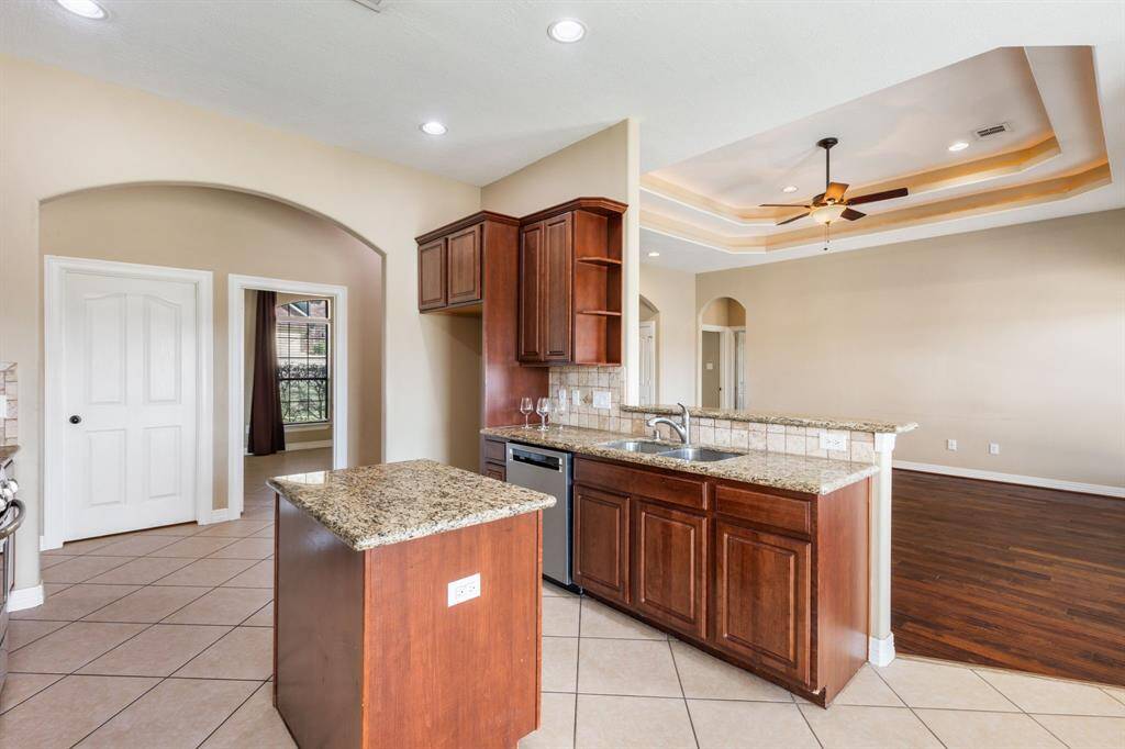 Fabulous kitchen with views into the living room and tons of counter space and storage.