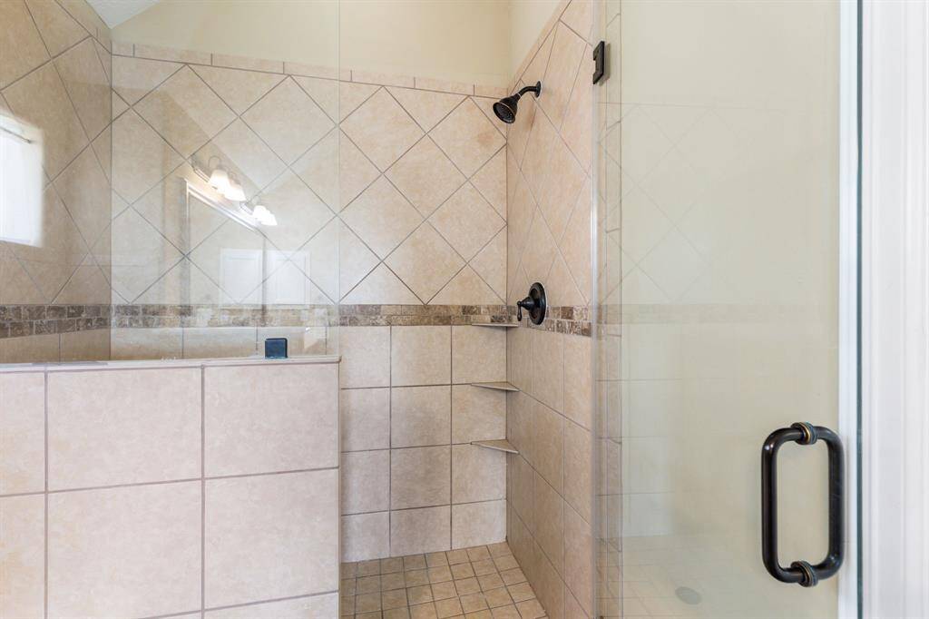 Oversized walk in shower.