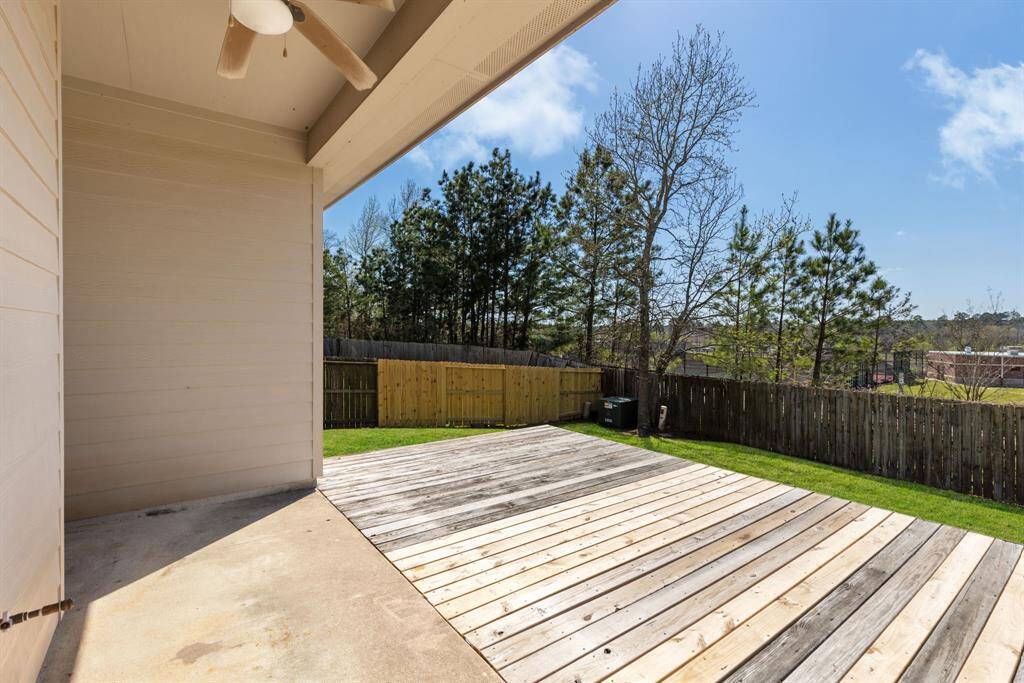 Beautiful covered patio and extended deck for relaxing or entertaining.