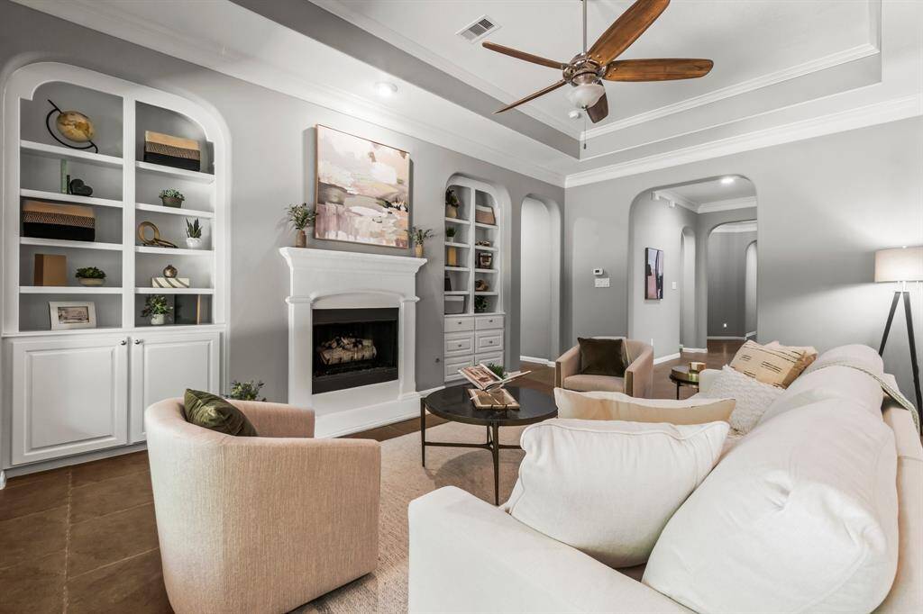 nother view of the living room showing arches and ceiling detail