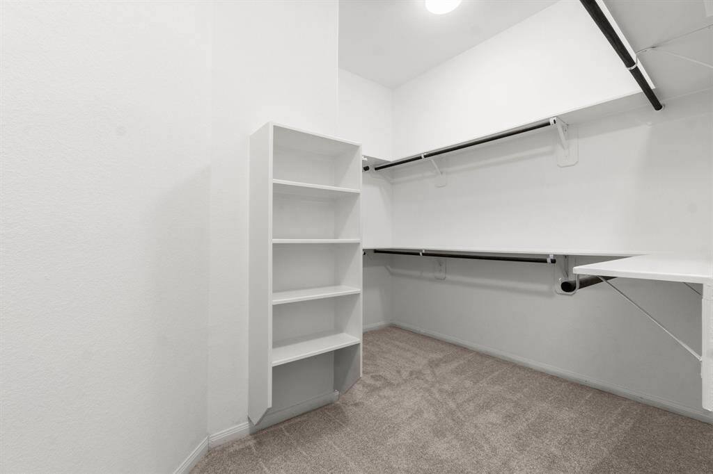 Walk-in master closet with plenty of storage