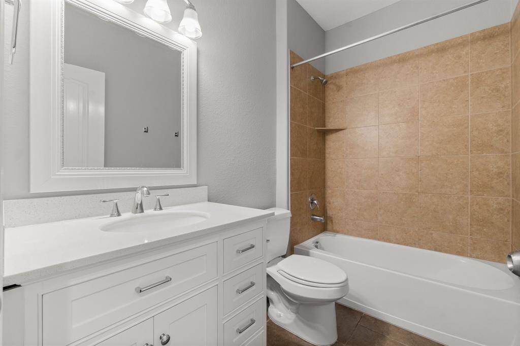 3rd bathroom downstairs with tub/shower combo