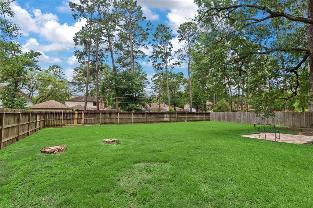 Such an awesome space! Don'y worry about keeping this yard green, there is a full sprinkler system on this property.
