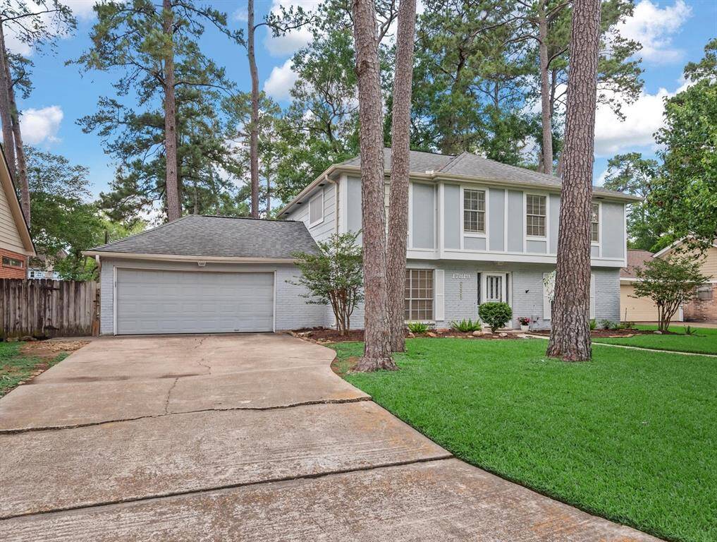 The attached two-car garage provides ample storage and parking space.