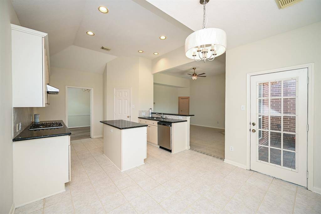 Breakfast are with door leading out to covered patio