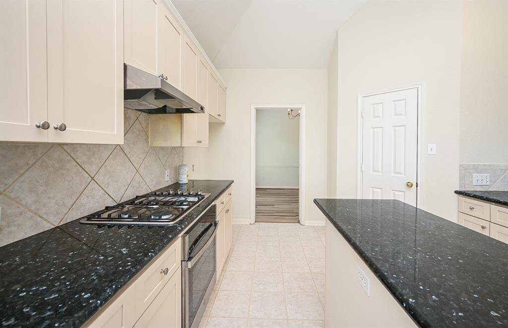 Closer view of this kitchen with walk-in pantry