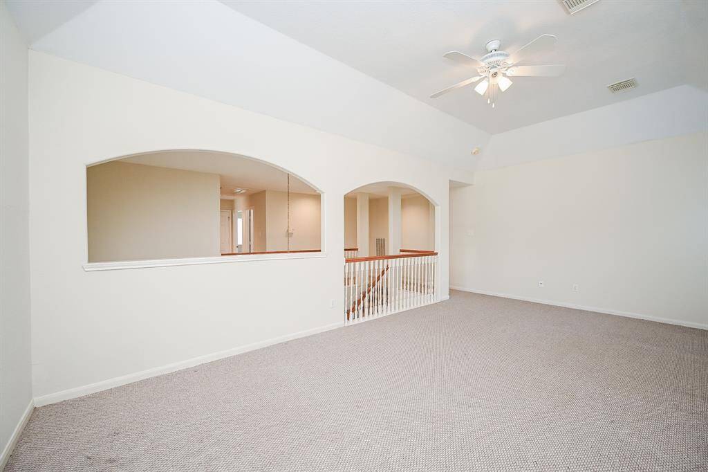 Game Room located upstairs with fresh paint.