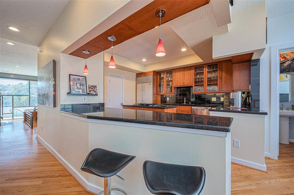 Discover the inviting second living area just off the kitchen—perfect for cozy gatherings or a peaceful retreat!