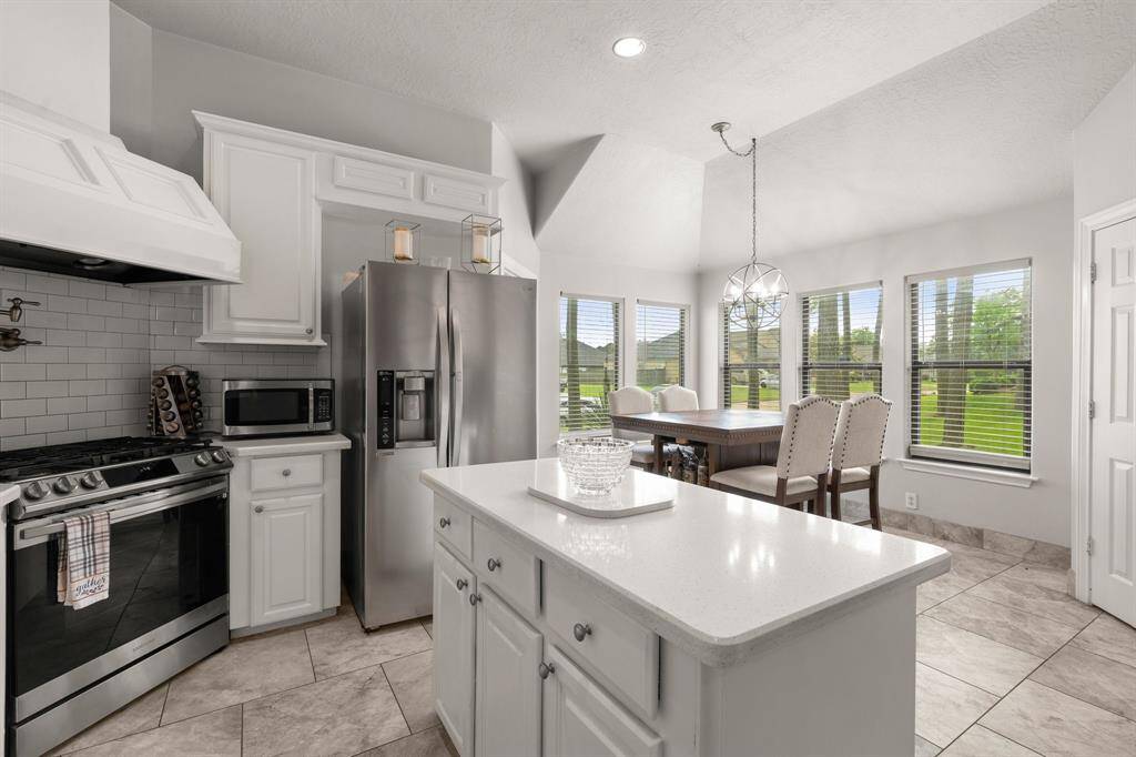 Nice windows and spacious area for cooking and enjoying family and friends.