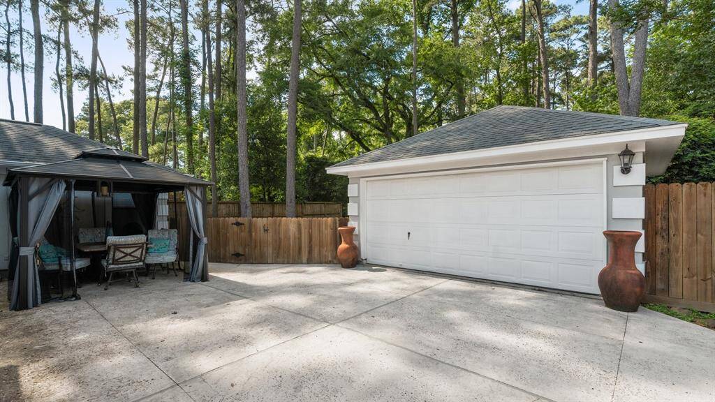 Seperate garage for parking car and a golf cart!