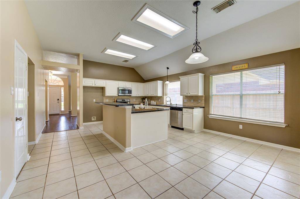 looking into kitchen from living room