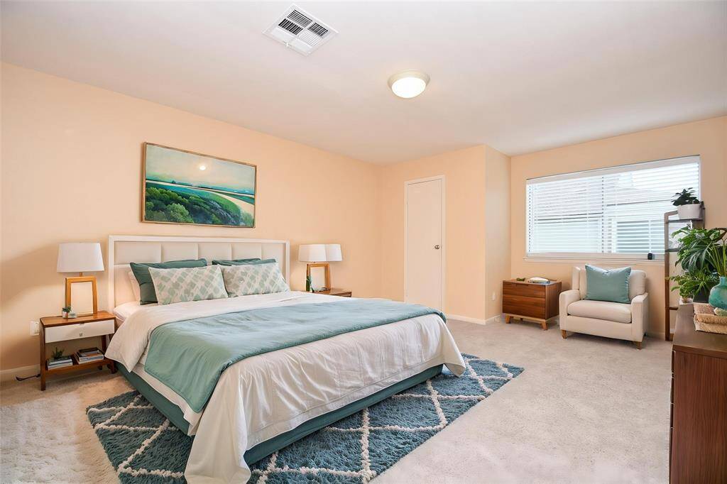 Virtually staged primary bedroom.