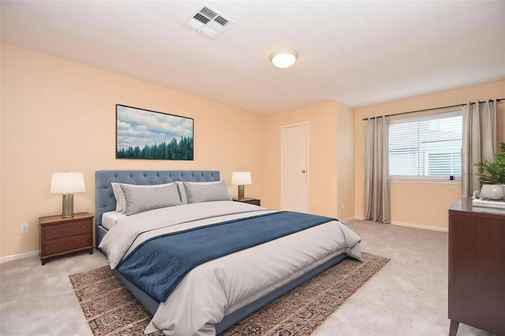 Virtually staged primary bedroom.