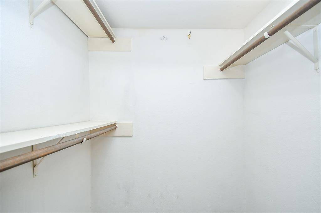 Walk in closet for Primary bedroom.