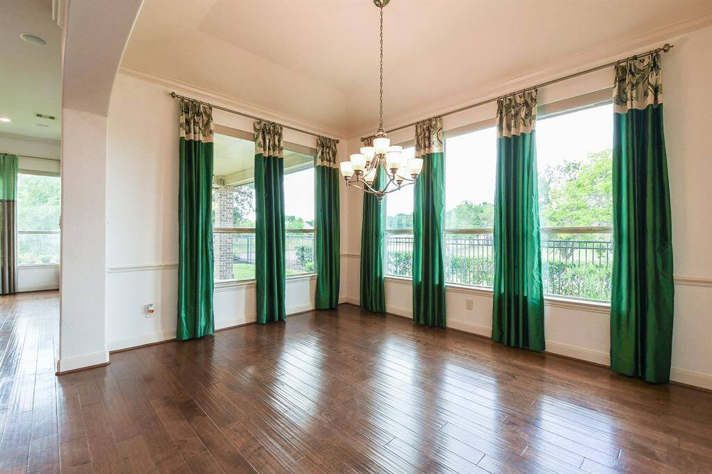 This formal dining space, off the main hallway, offers just enough privacy and just enough accessibility for special entertaining.