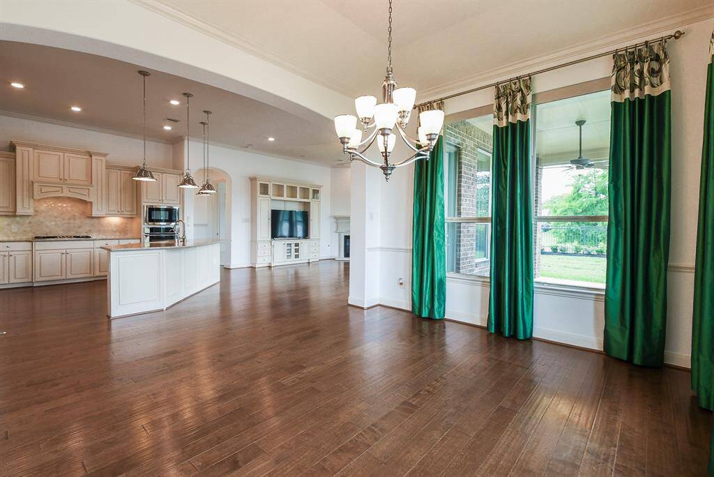Bright natural and interior lighting bathe this divine combined space a welcomed glow!