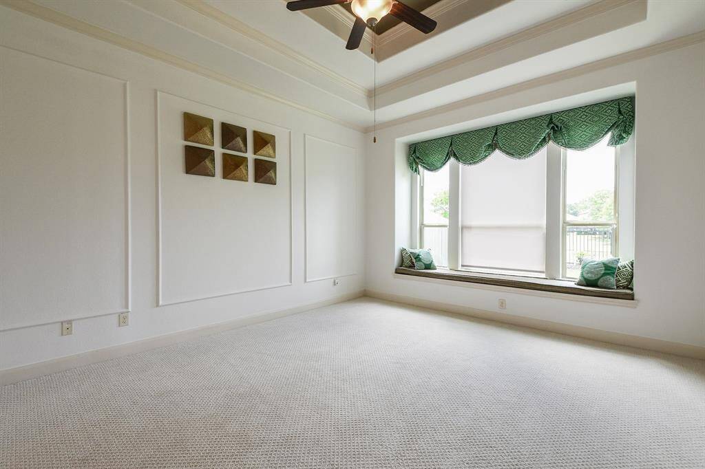 Even in a home of this amazing size, your primary suite appears as a comfy, cozy retreat!