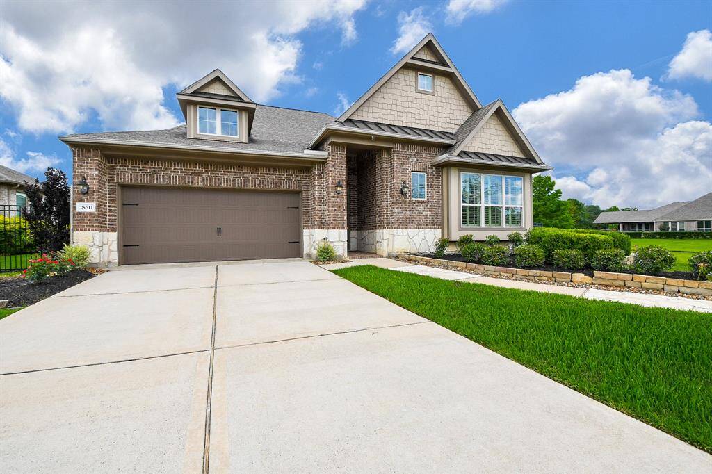 Just comfortably pull right into the attached garages, atop a roomy driveway.