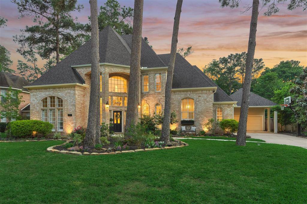 Beautifully updated custom home in Panther Creek - Perfect blend of style, function, and location.