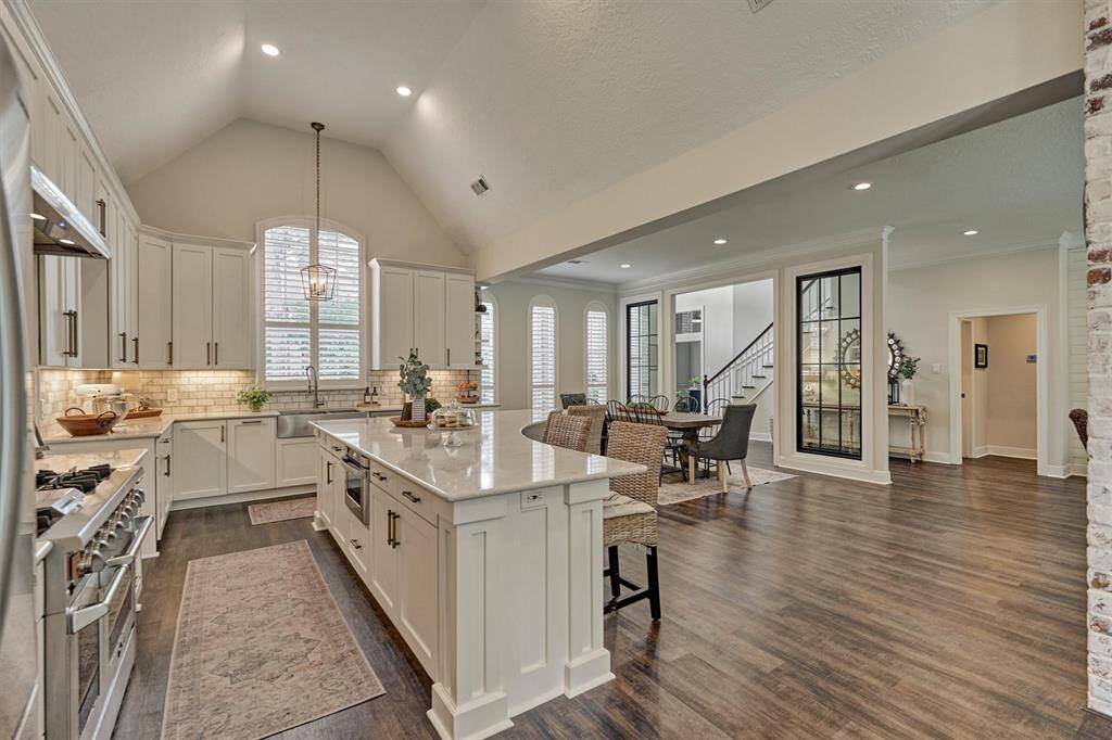Completely redesigned first floor features a bright, open-concept layout.