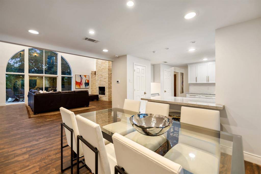 Grand size Breakfast Room (13 x 11) opens to the Kitchen (20 x 12) and the Family Room (22 x 21) making entertaining easy.  The Kitchen remains a bit out of view which comes in handy from time to time.