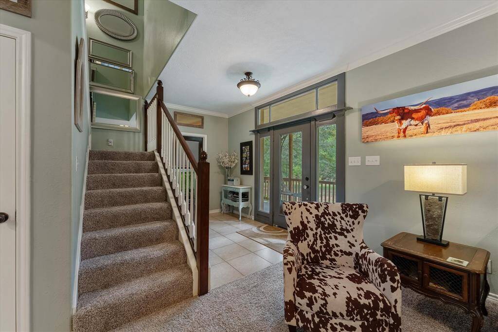 View from the living area towards front door and side yard.