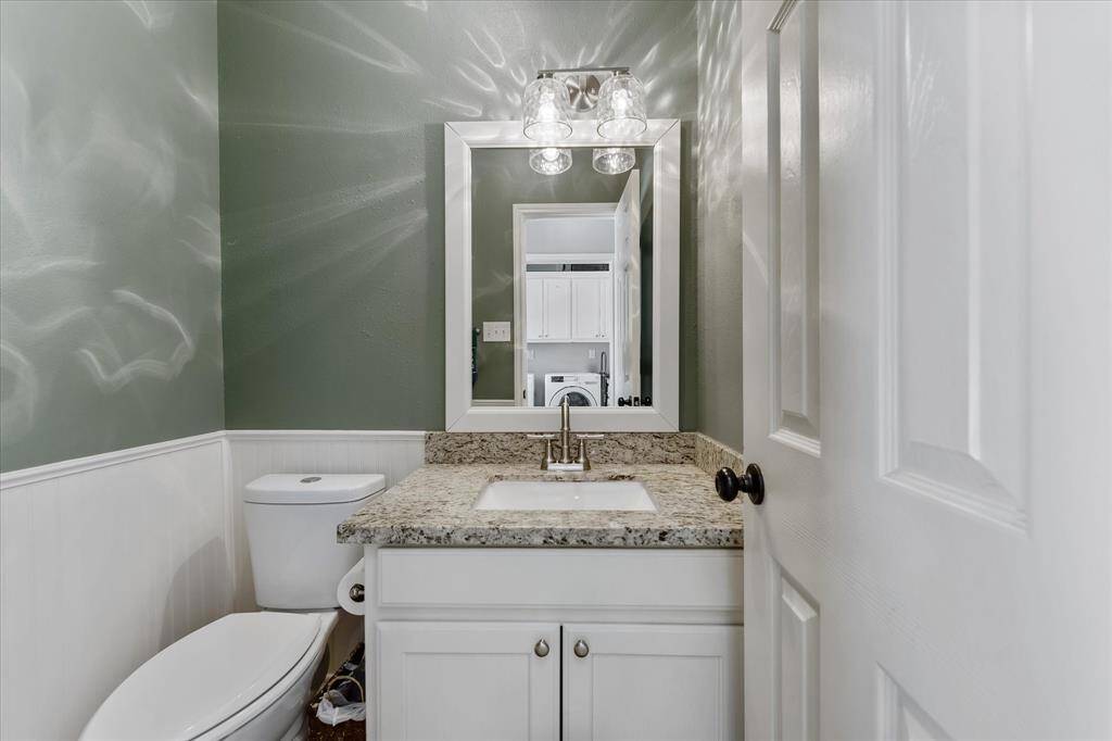 Half Bath located off side entry, updated 2022.