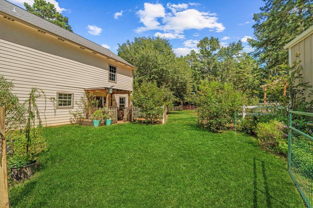 Gated side yard off kitchen and side entry.