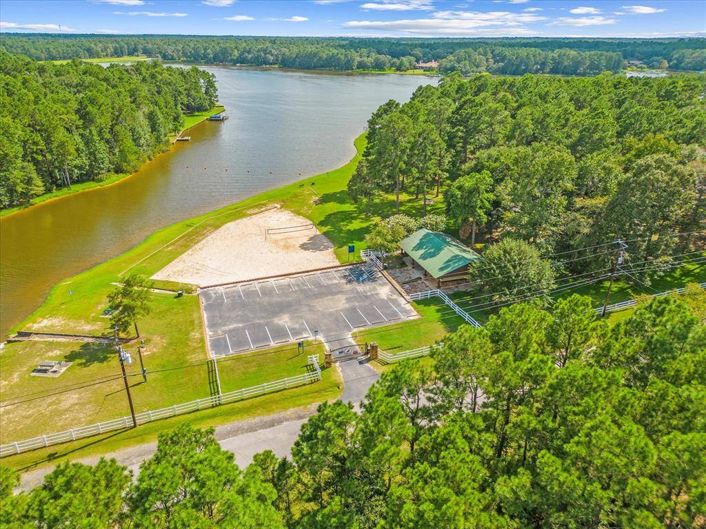 Includes fishing & recreational lake, sandy beach, and Volleyball Court.