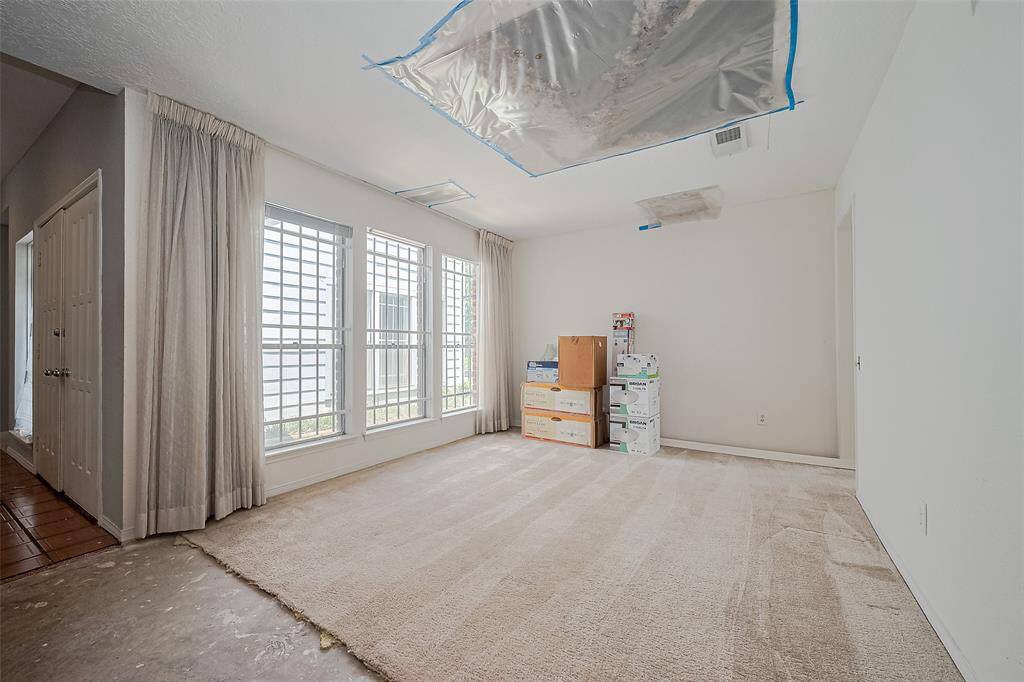 The formal dining is located next to the kitchen. Would you keep this room or open it to the kitchen? This could also be a great office space.