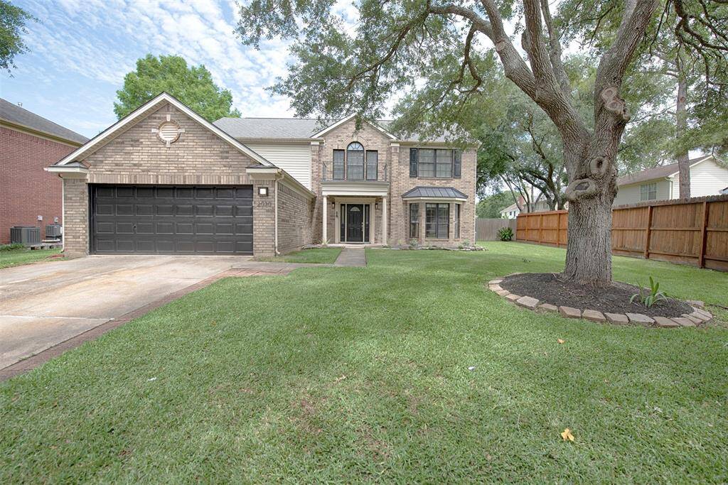 Gorgeous updated home on huge lot close to great shopping, CCISD schools and restaurants.