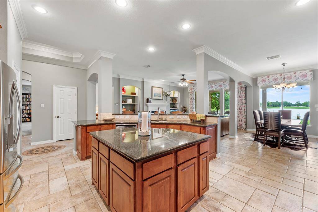 Alternate view of the kitchen highlighting the center island.