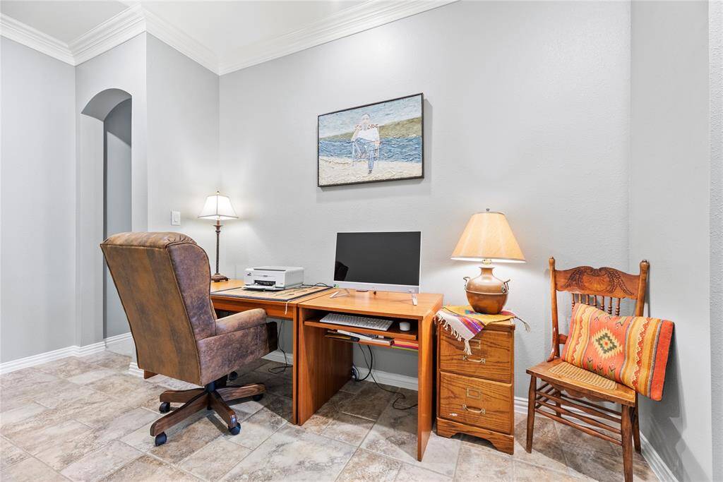 Outside the primary bedroom is a home data station which is secluded from the family room area but away from the secondary bedrooms.