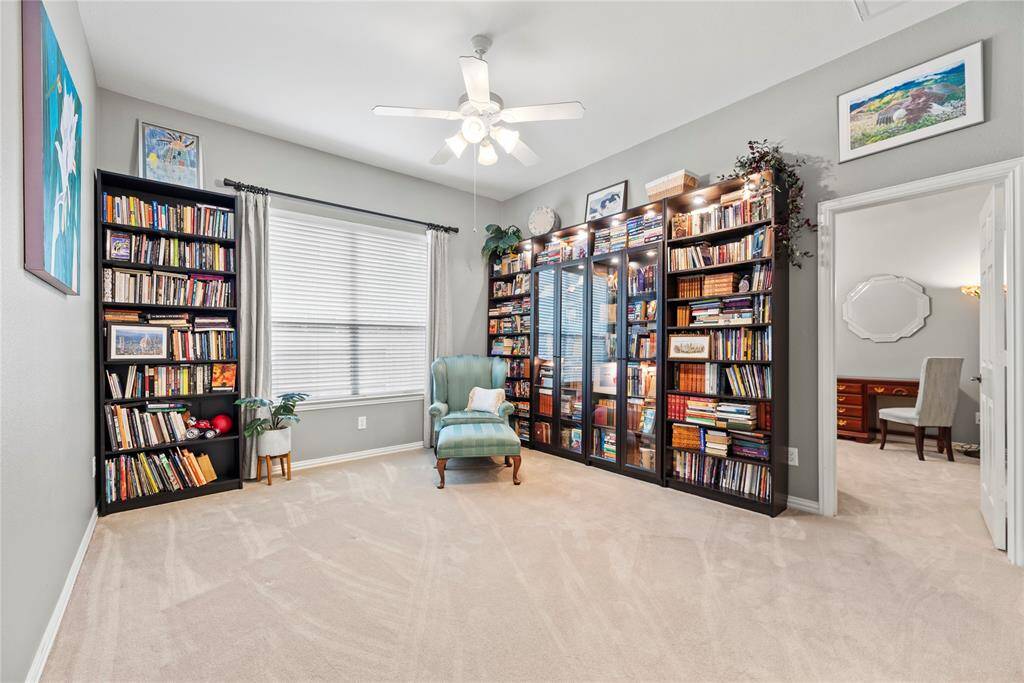 Childs retreat in-between the two secondary bedrooms and bath # 2.  This is a great space for a game room, sitting area, second family/tv watching space or a great reading library.