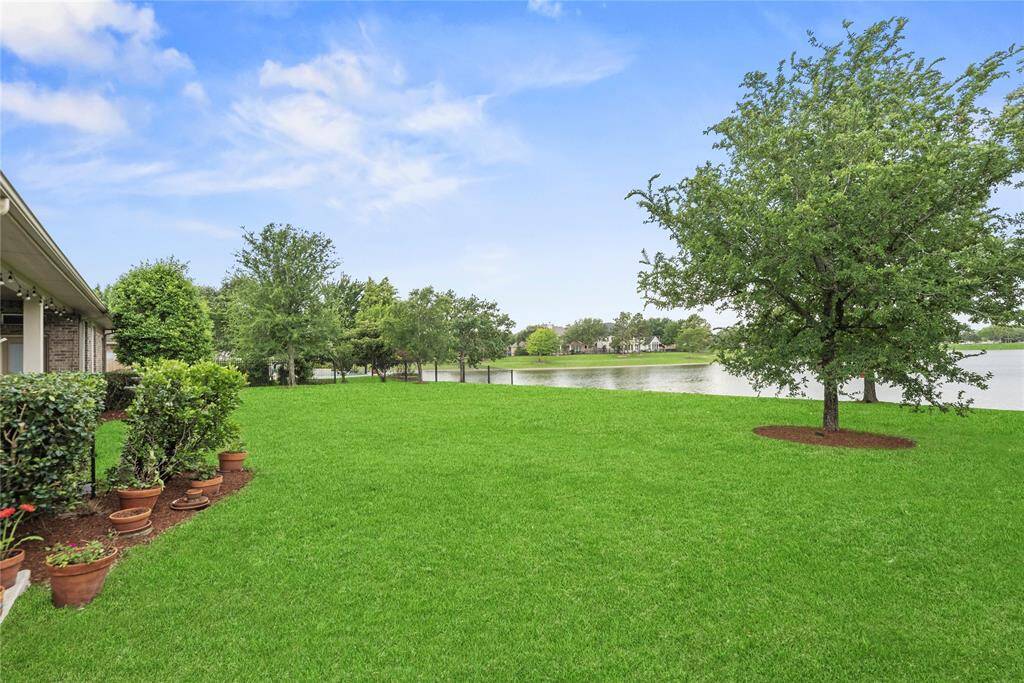 Alternate view of the backyard from the rights side yard.
