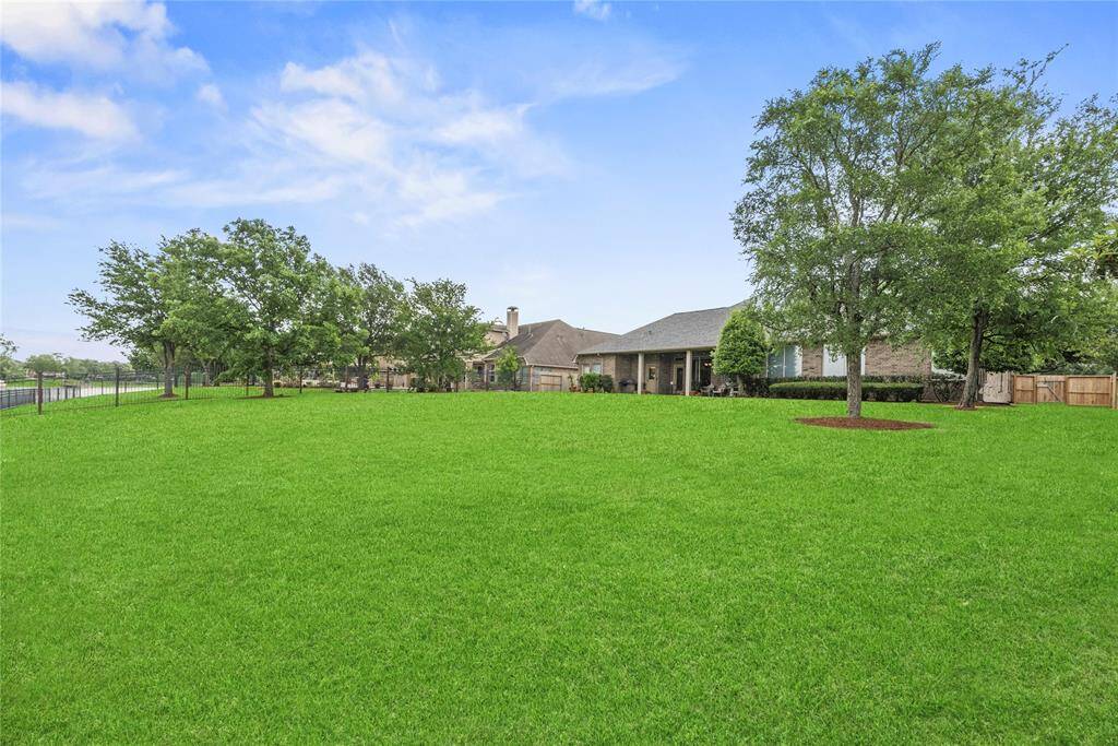 Alternate view of the backyard rear left corner towards the home.