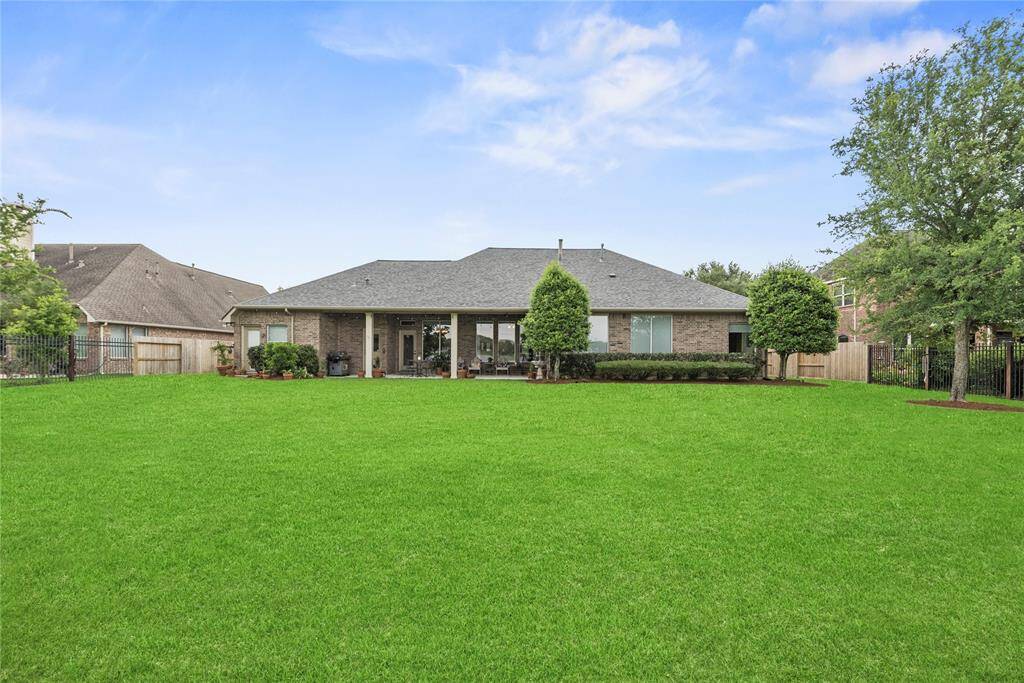 Alternate view of the home from the rear yard.