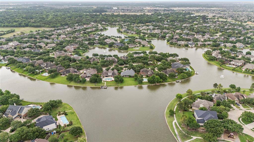 Another aerial view of the property from farther back over the lake.