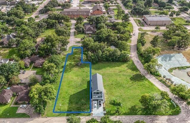 Blue lot combines lots 8, 9, 10, 11 & 12 for a 37,774 SF lot