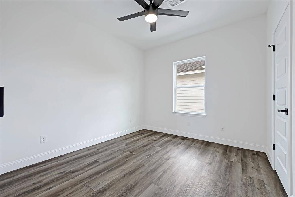 A modern ceiling fan, perfect for a cozy bedroom or stylish home office.